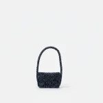 Sac soirée perles noires porté épaule